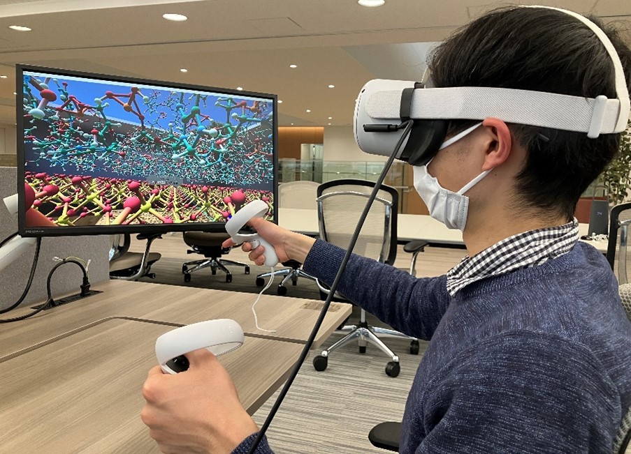 An engineer using VR with a head-mounted display